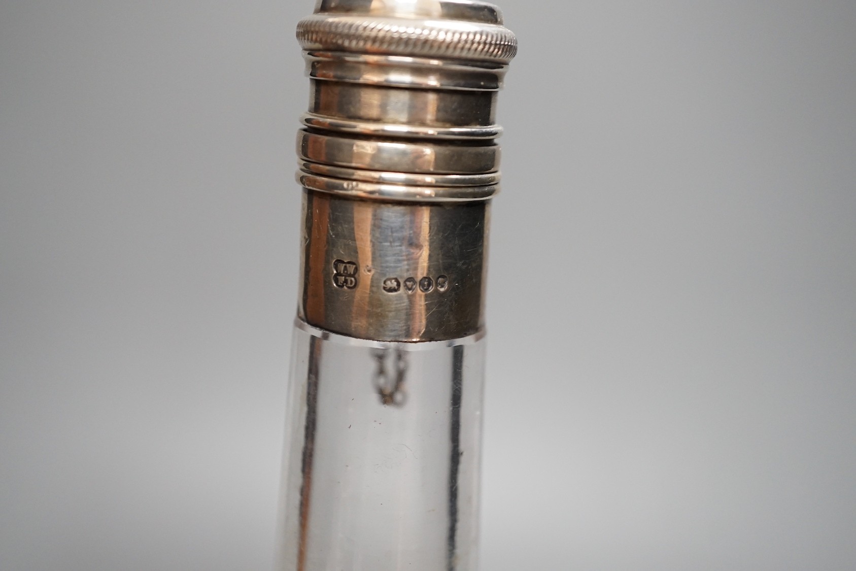 A Victorian silver mounted travelling glass flask in fitted brown leather case